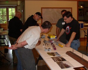 Mike Faletti discusses his models with fellow meet attendees