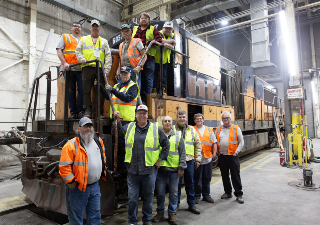 Group photo at the 5057 open house in October 2025 