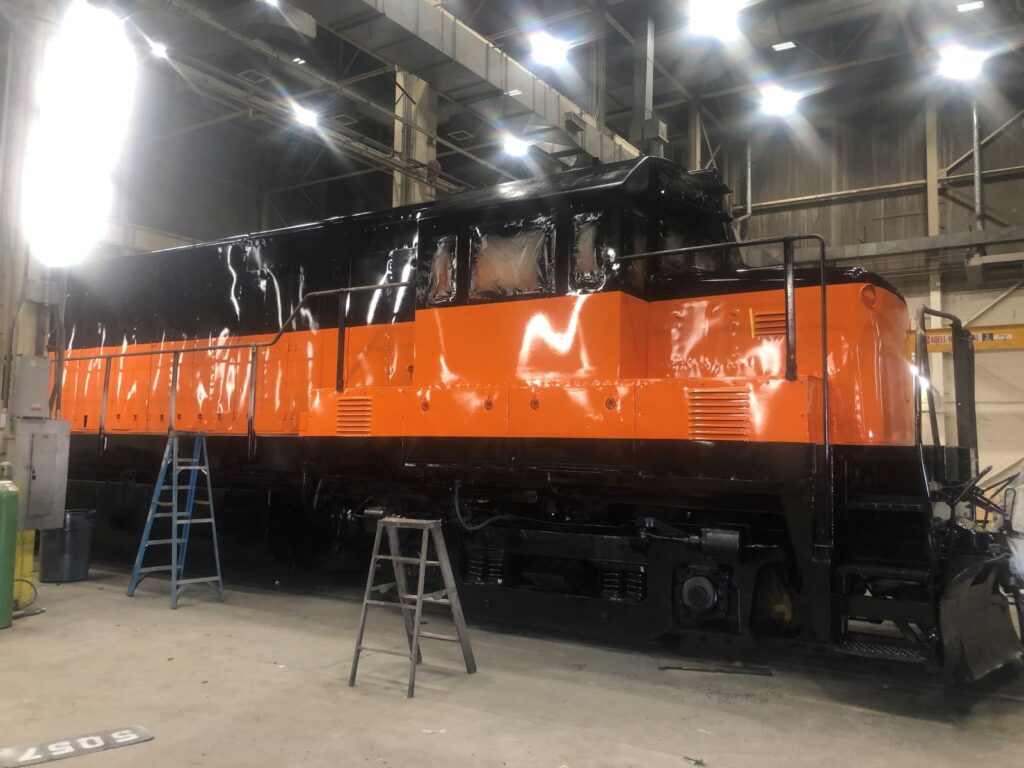 Fresh paint on Milwaukee Road 5057 at the Columbia Rail shop in Richland, WA